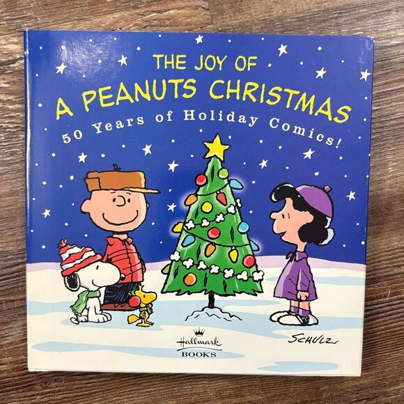 The Joy of A Peanuts Christmas 50 Years of Holiday Comics Charlie Brown Book - Picture 1 of 6